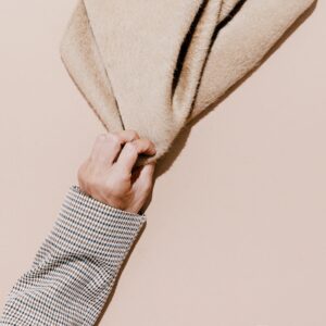Monochrome scarf study on ivory backdrop