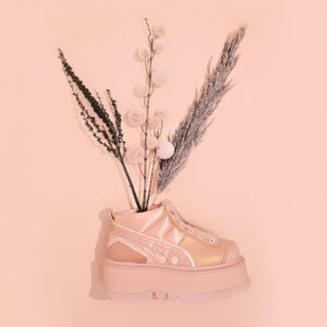 Minimal monochrome footwear flat lay study